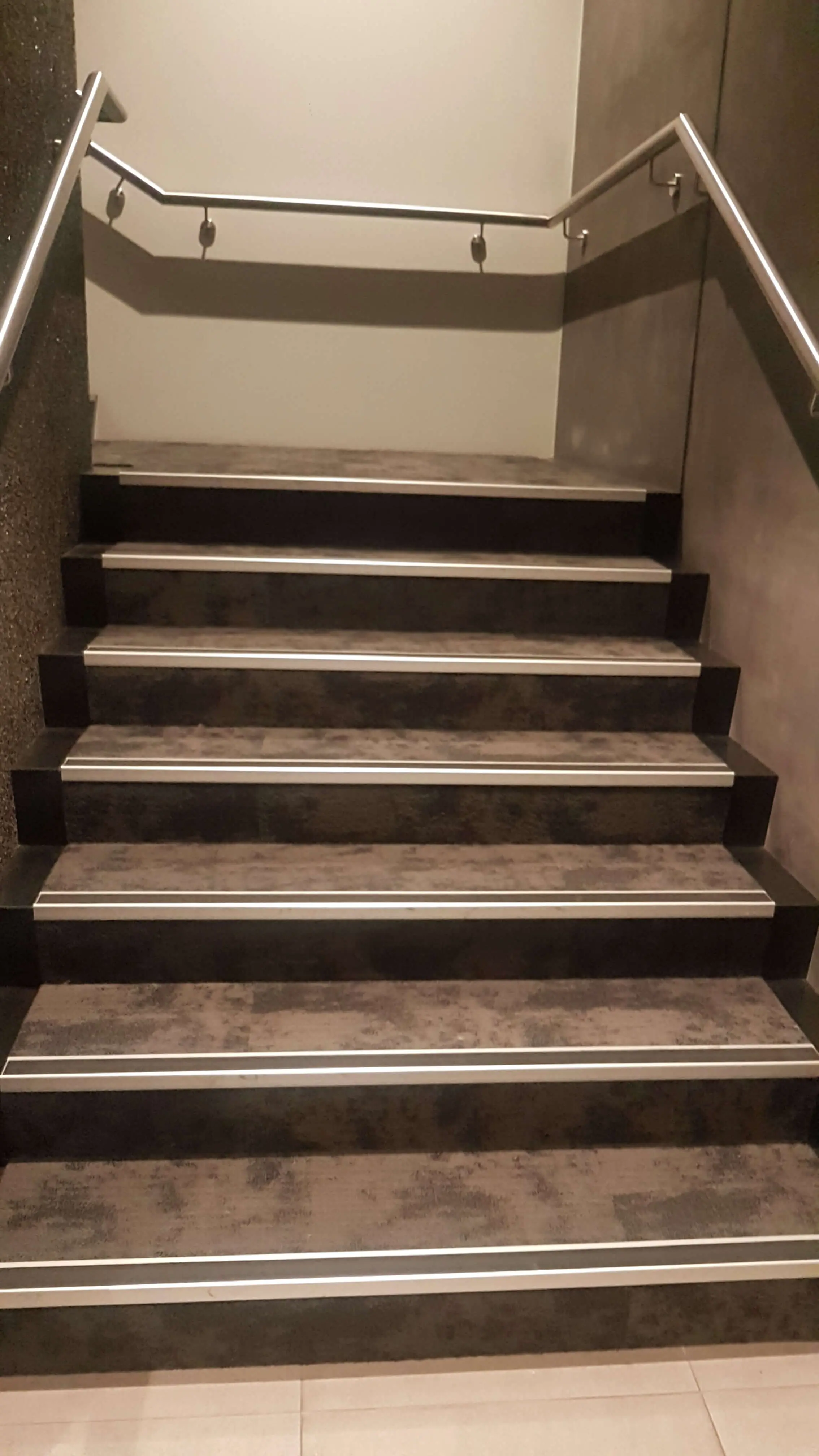 Quest Apartments: Timber-look flooring in the apartments and patterned carpet in the corridor