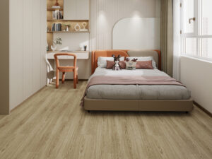 Bedroom with a double bed on natural oak-look flooring