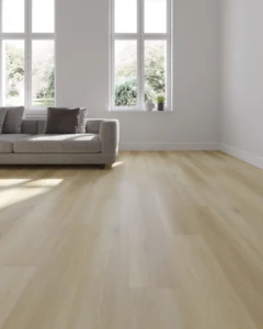 Living room corner with a grey sofa on light oak-look flooring