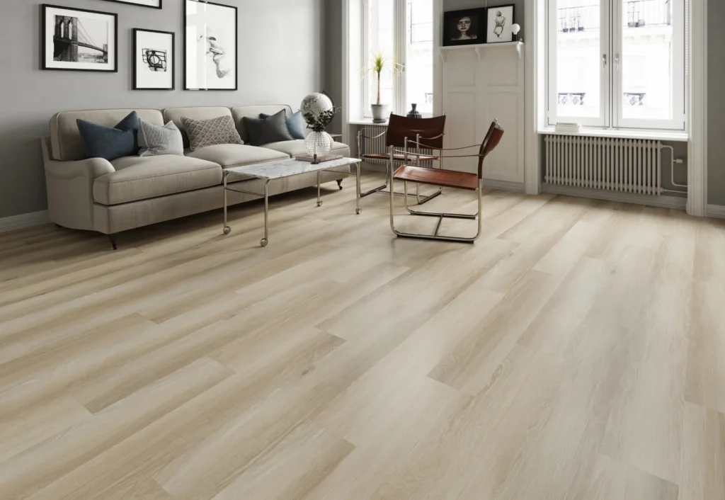 Living room with a grey sofa on light oak-look flooring