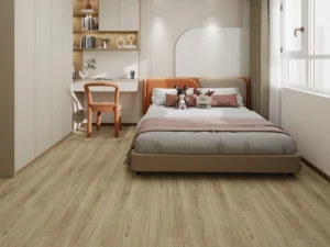Bedroom with a double bed on natural oak-look flooring